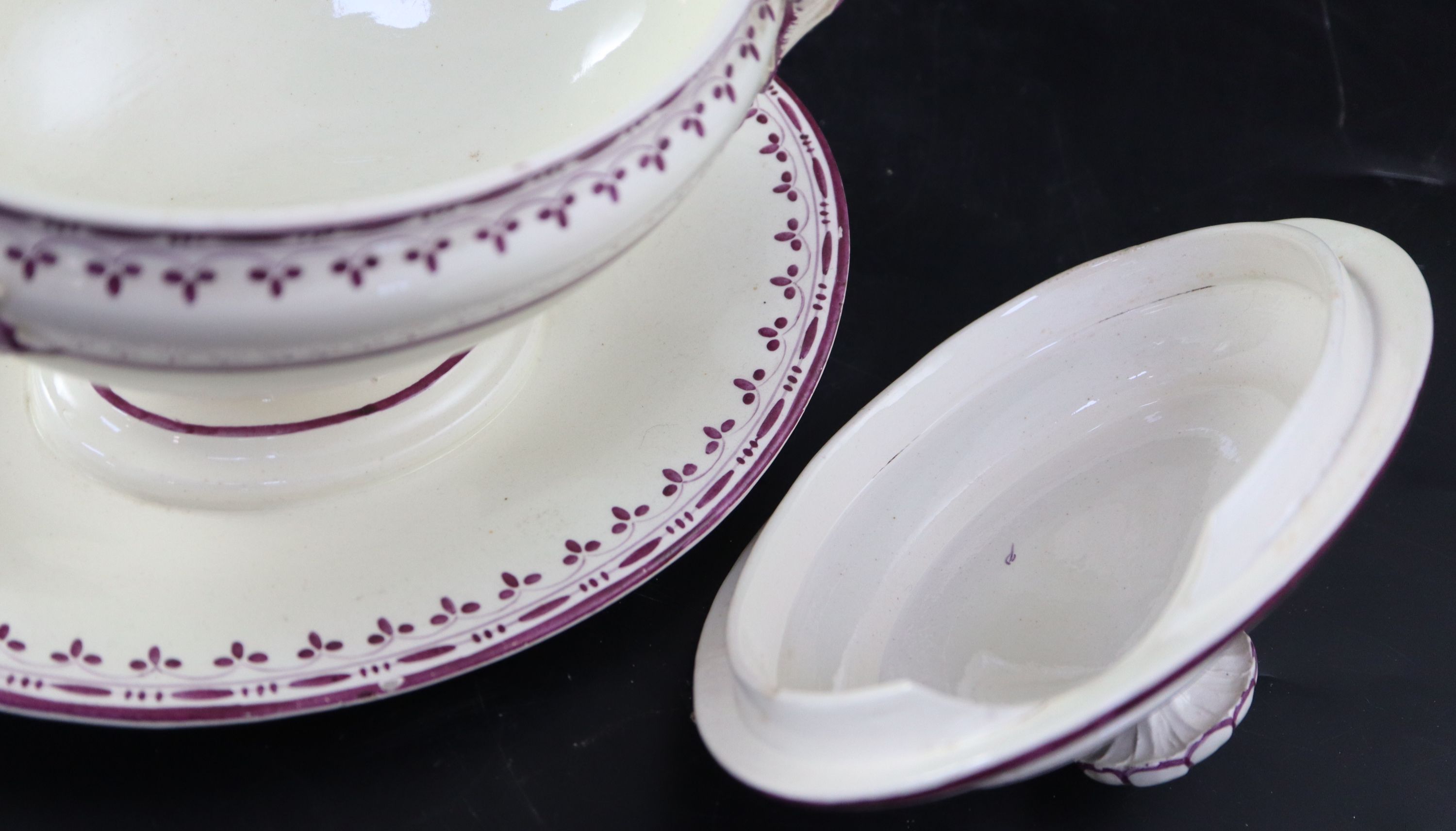 A pair of Wedgwood creamware oval sauce tureens, covers and fixed stands, and three matching serving dishes, c.1800, width 22cm